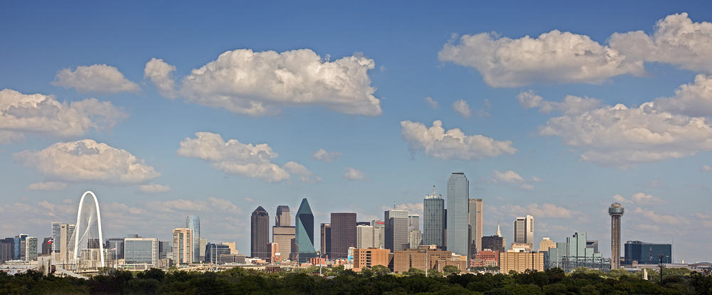 Dallas skyline with text overlay reading Professional Eviction Services in Dallas